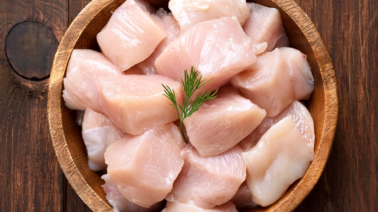 Raw chicken pieces in a bowl