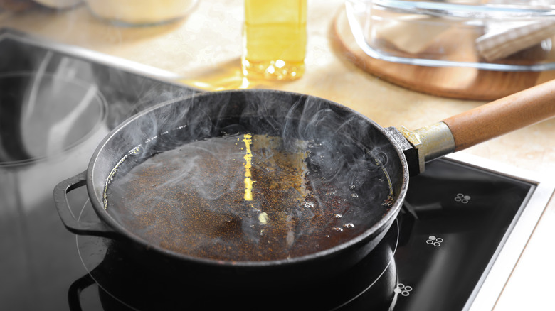 Pan of oil on stove smoking