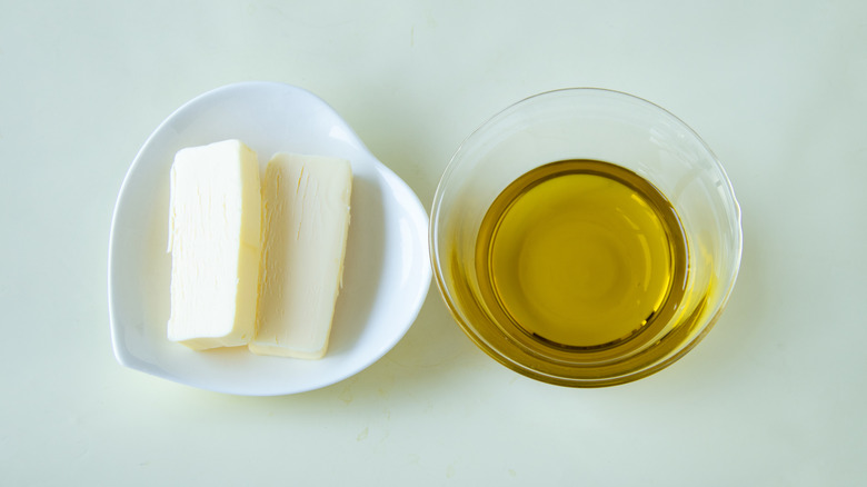 Butter and oil in side by side dishes