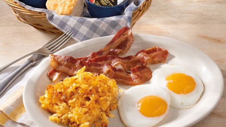 Old Timer's Breakfast - two fried eggs, three stirps of bacon, and hash browns