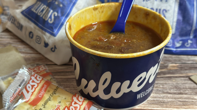 Culver's George's Chili  in cup with a spoon in it