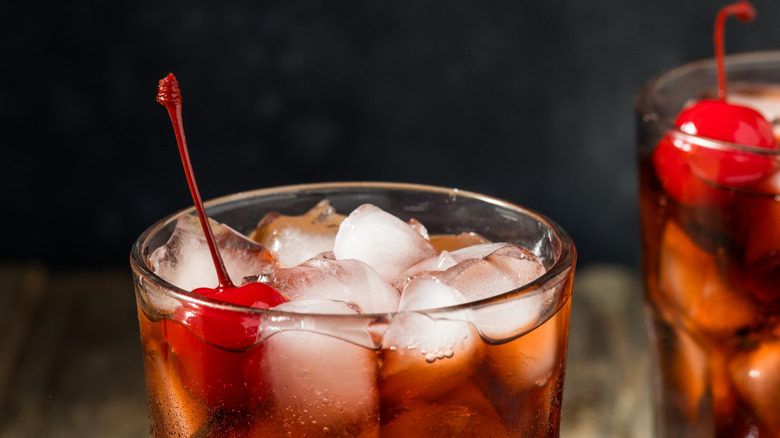 A close-up of cherry cola in a glass