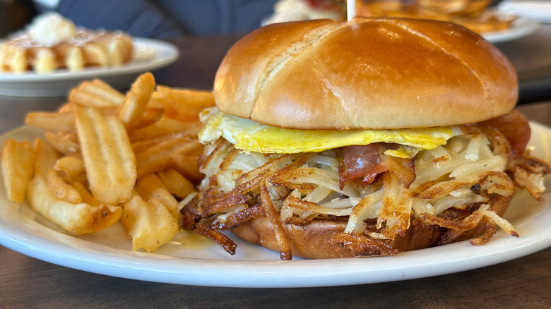 Slam Burger with fries on plate