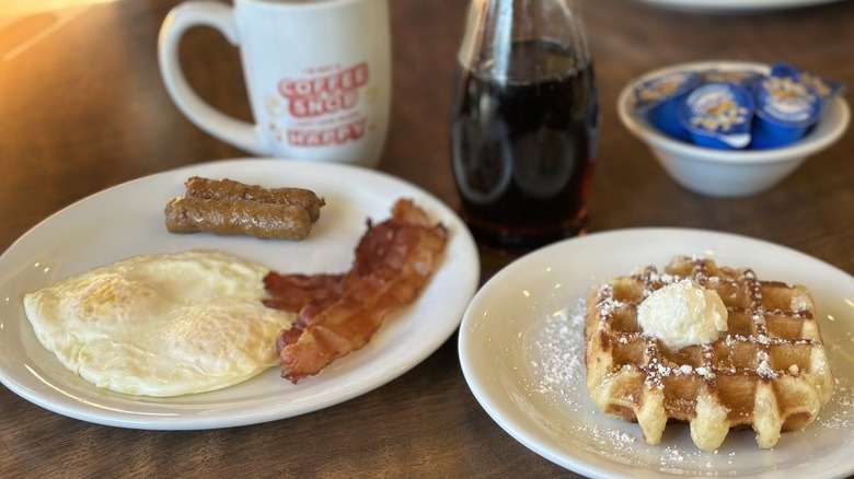 Waffle Slam with eggs bacon and sausage