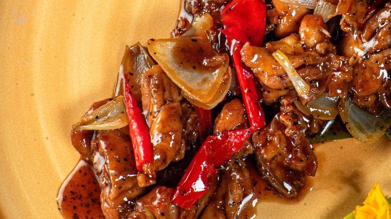 Chicken satay stir fry on a plate