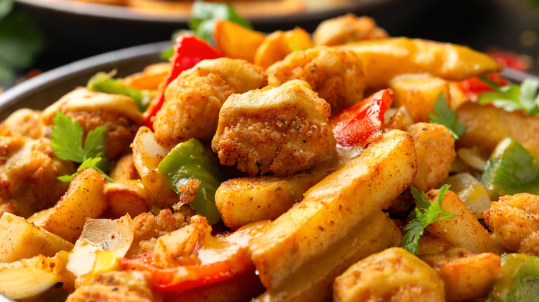 Spice bag Chinese food dish, on a plate