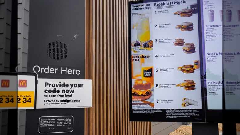 A McDonald's order speaker and menu in drive-thru