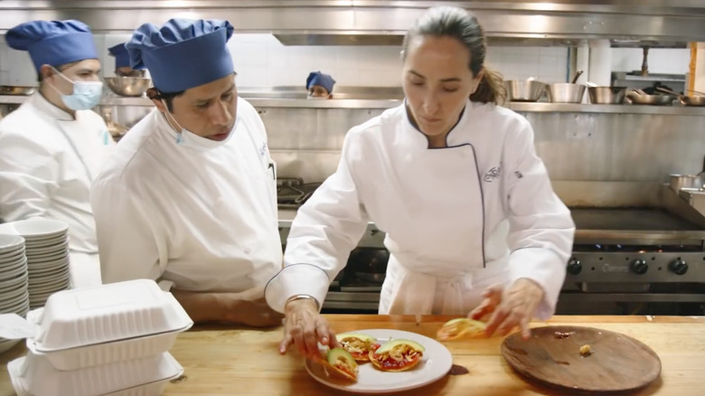 Chef Gabriela Cámara plating a dish in "A Tale of Two Kitchens"