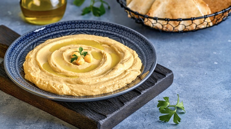 Hummus in a blue bowl