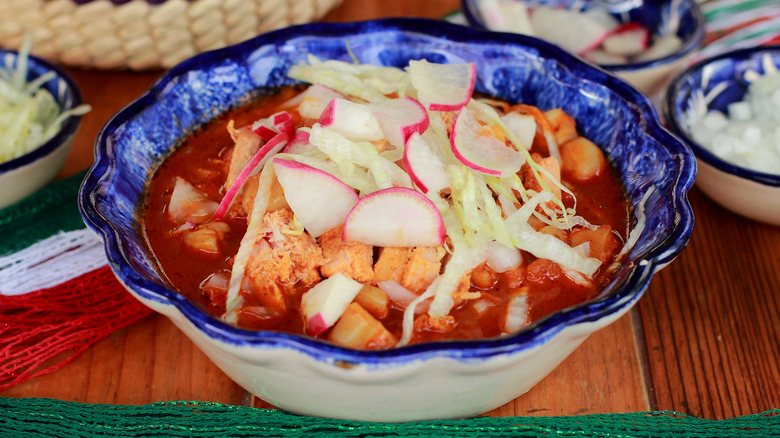 Bowl of pozole with cabbage and radishes