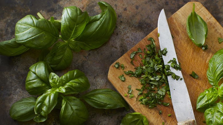 Fresh basil on cutting board