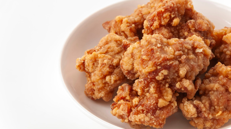 Crispy Japanese fried chicken karaage in a white bowl