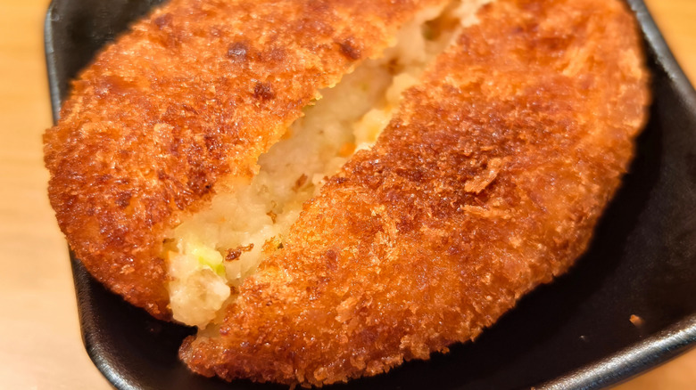Deep fried crunchy Japanese potato croquette cut open