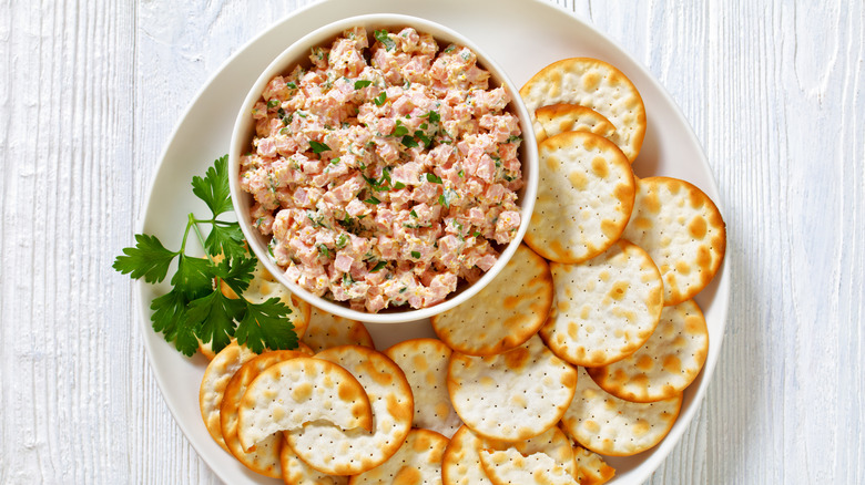 Ham salad in bowl with crackers