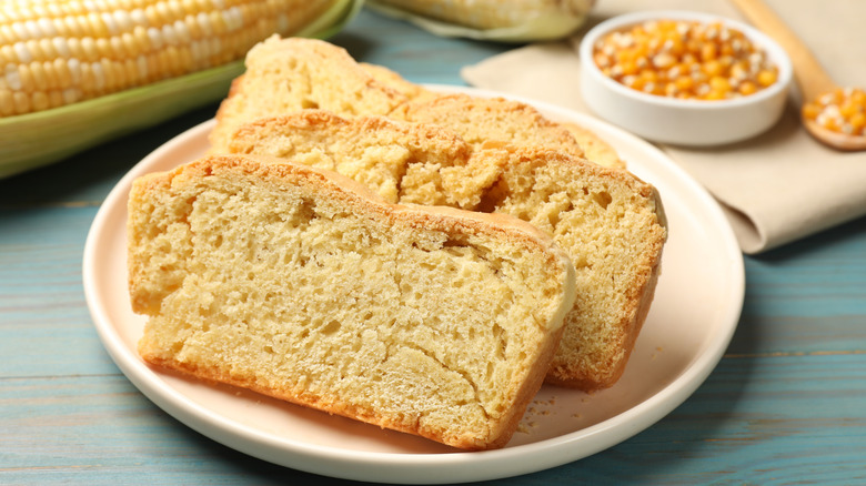 Sliced cornbread on a white plate
