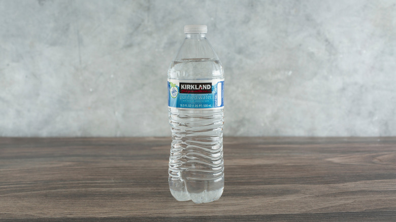 plastic bottle of Kirkland Signature purified water