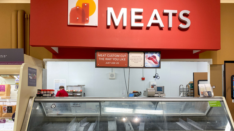 Meat department at a Publix grocery store with empty display case