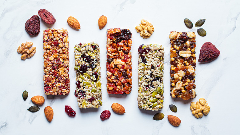 A selection of brightly-colored granola bars on a table