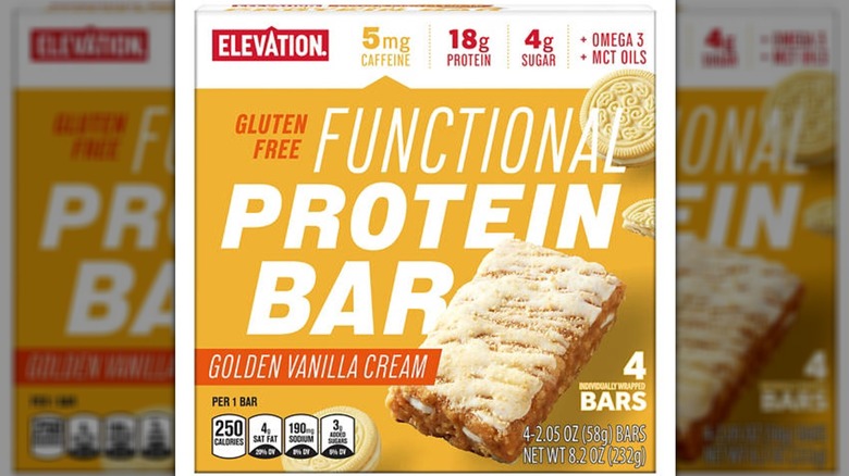 A box of Aldi Elevation Functional Protein Bars in golden vanilla cream