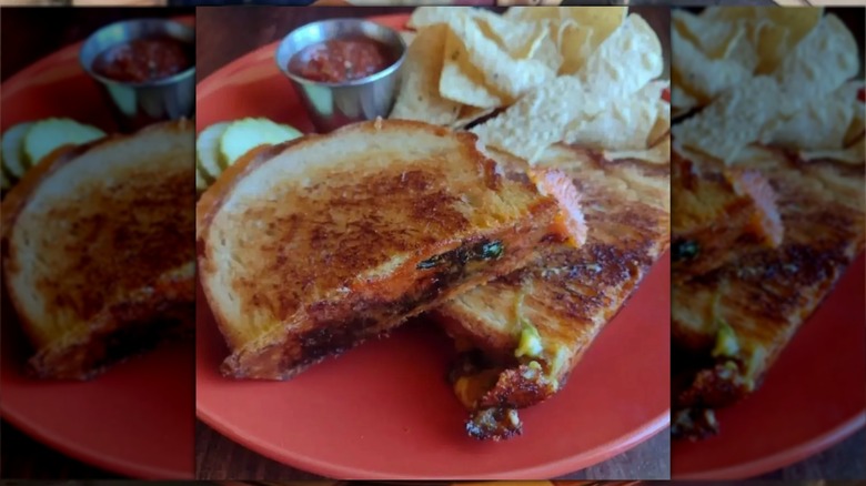 Bouldin Creek Cafe grilled cheese sandwiches on red plate