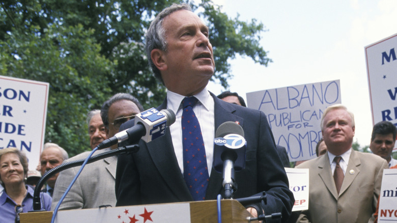 Michael Bloomberg at a podium while running for mayor of NYC