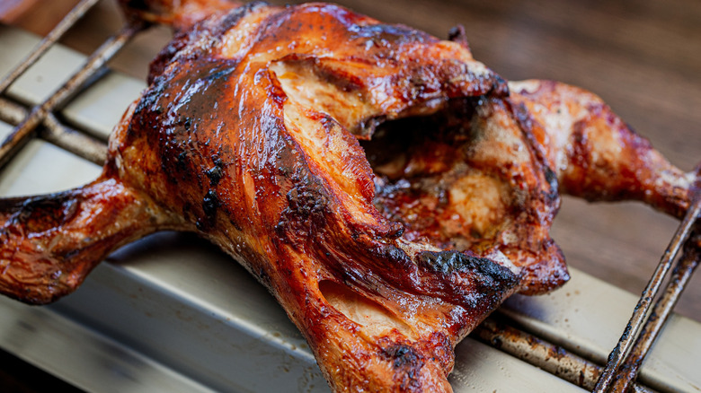 Huli huli chicken on a grill