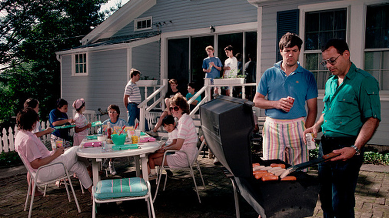 A family from the 1970s having a barbecue