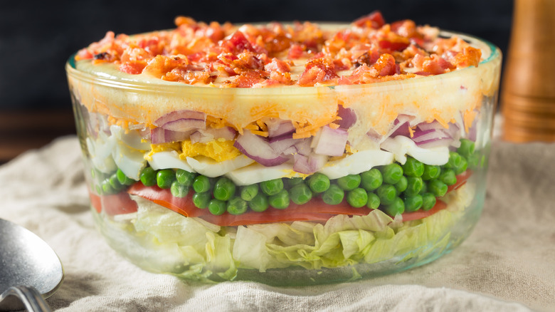 A bowl of seven-layer salad
