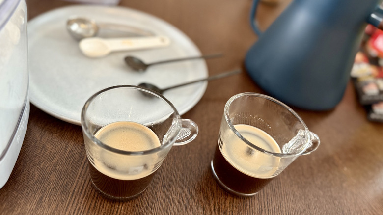 Two espresso glasses on table
