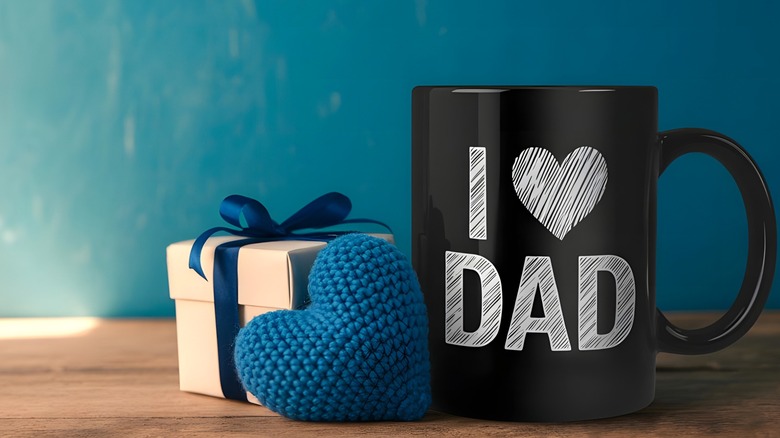 Black coffee mug reading 