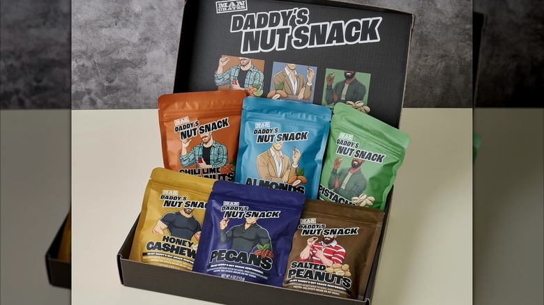 Daddy's Nut Snack gourmet mixed nuts gift basket on a table.