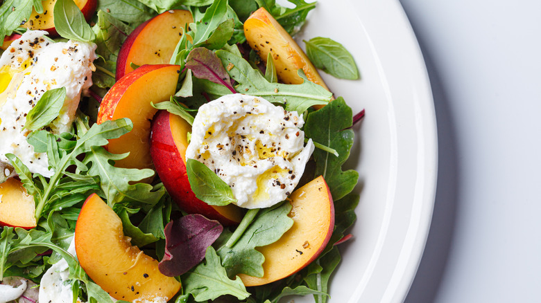 Up-close salad on a white plate