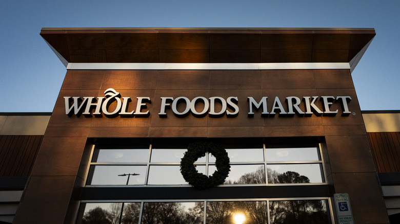 Whole Foods store decorated with a Christmas wreath