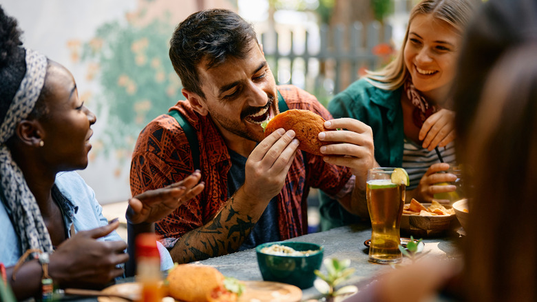 People enjoying Mexican food in a restaurant