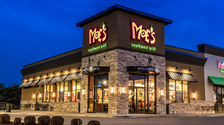 Exterior of a Moe's Southwest Grill, night