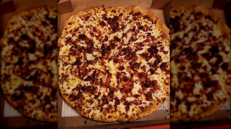 A Casey's chicken bacon ranch pizza in its box.