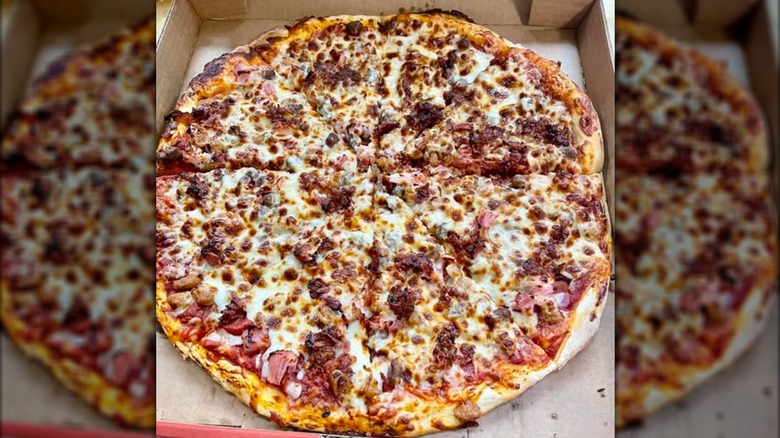 A Casey's ultimate meat pizza in its box.
