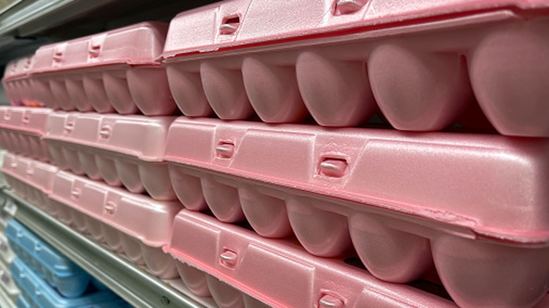 Rows of egg cartons in store