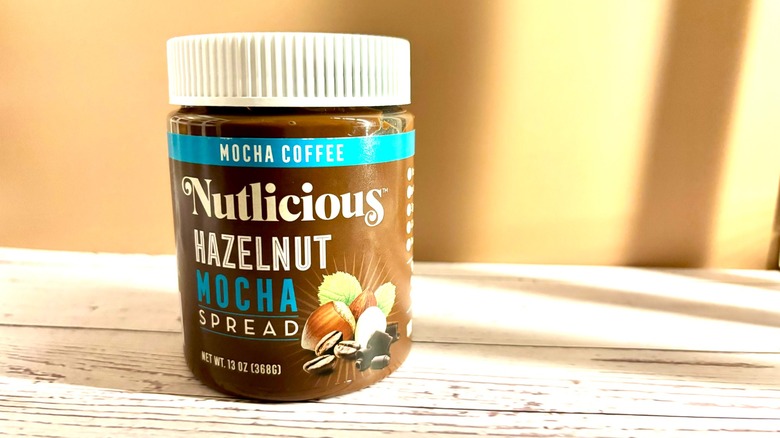 Nutlicious Hazelnut Mocha Spread jar on table