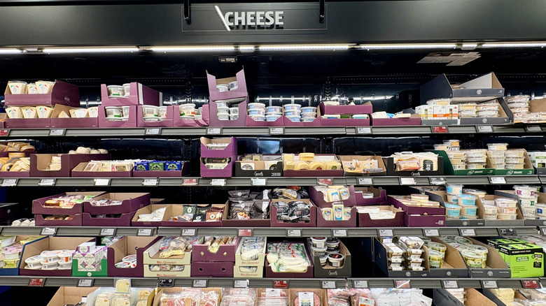 The cheese aisle of an Aldi's store.