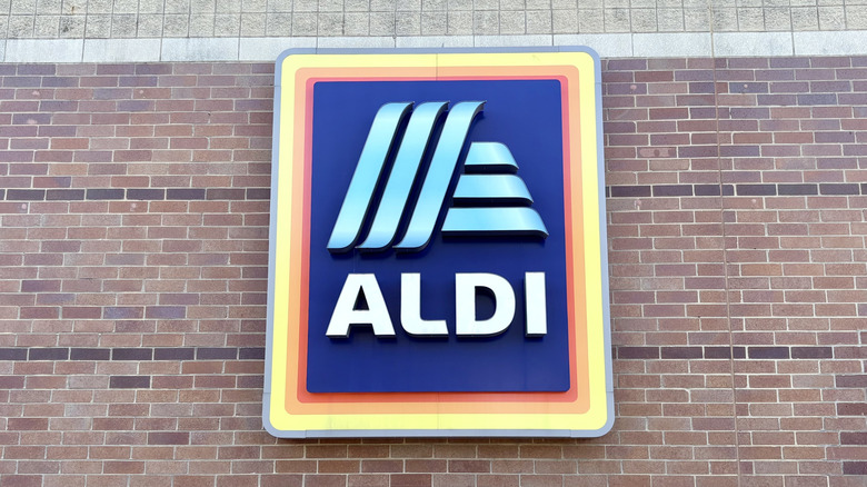 An Aldi sign on the exterior of a store