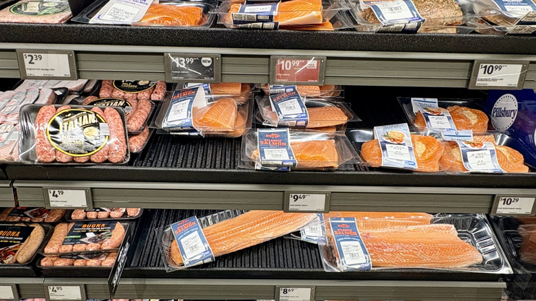 The fish section of an Aldi, with packaged salmon on display.