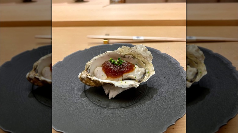 Oyster dish served in the shell at Sushi Noz