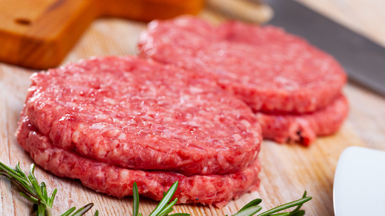 Raw burger patties