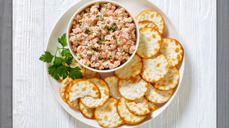 Ham salad in a little bowl served with crackers