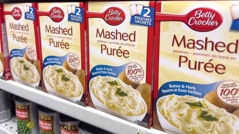 Instant boxed mashed potatoes on a store shelf