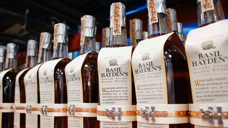 Bottles of Basil Hayden's bourbon on a store shelf