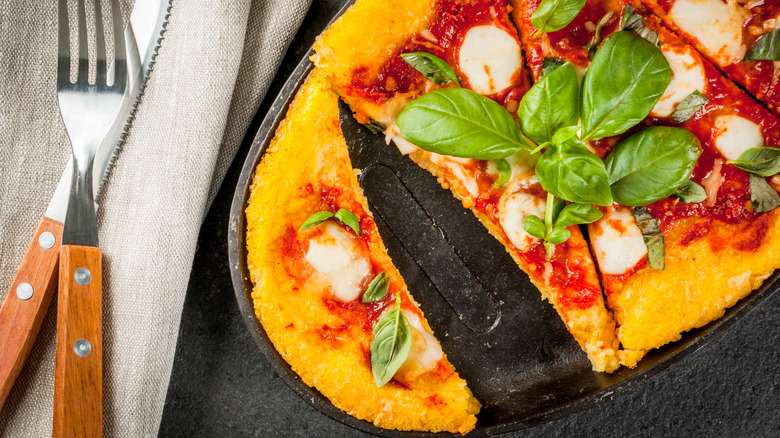 Polenta pizza pieces on a dish