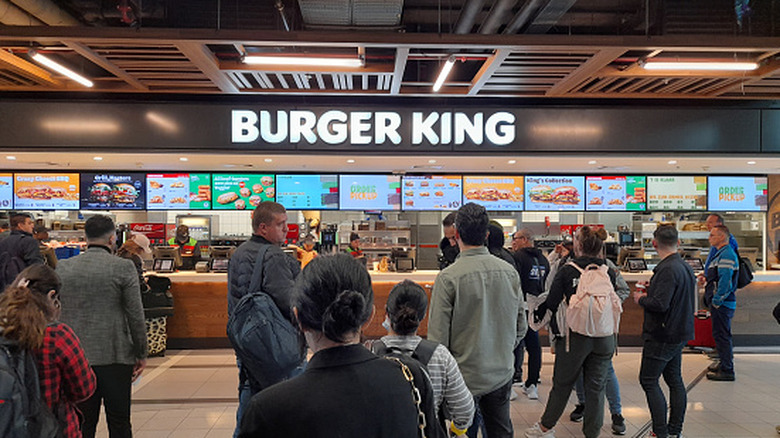 Customers in lines at a Burger King restaurant