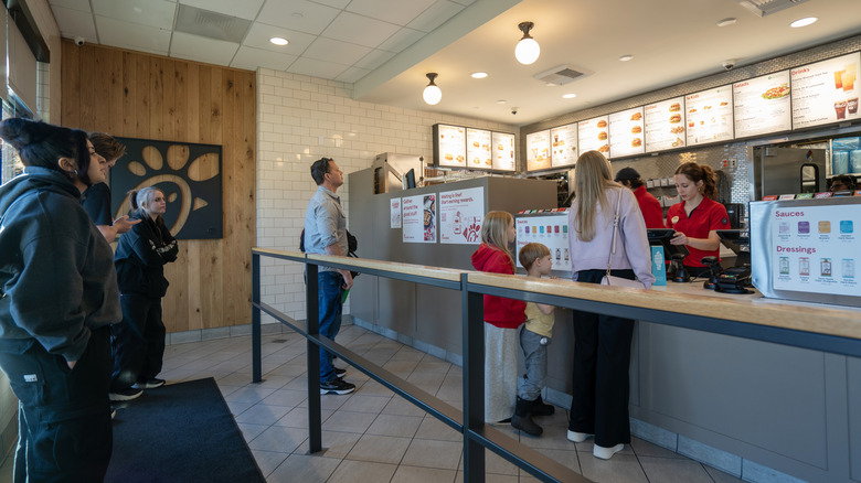 Customers ordering food in Chick-fil-A